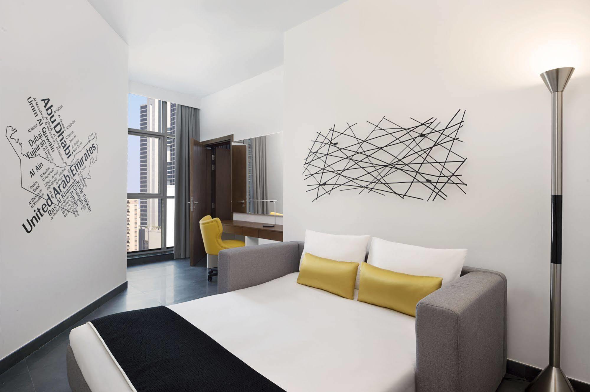 Tryp By Wyndham Dubai Hotel Exterior foto The map of the United Arab Emirates on the wall of the room