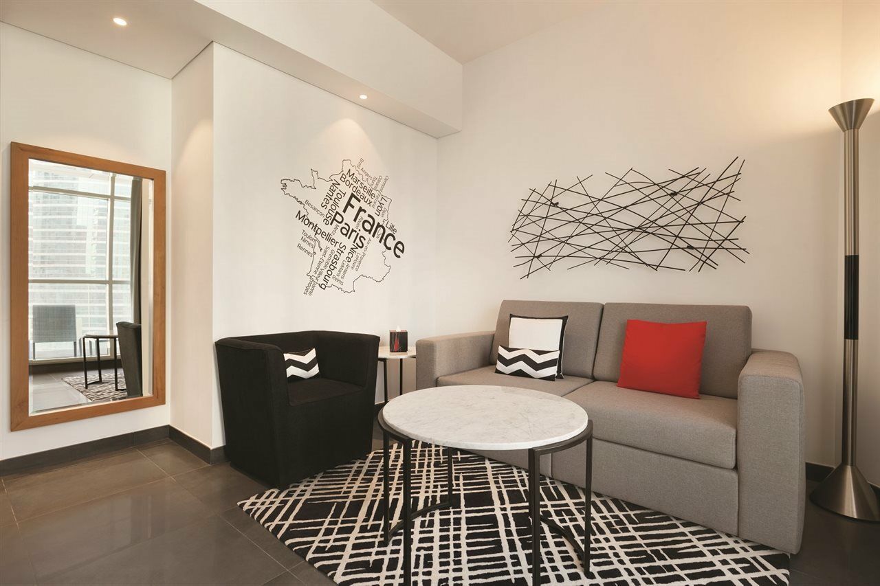 Tryp By Wyndham Dubai Hotel Exterior foto The word "Paris" in the wall of a room at the Westin Paris Opera